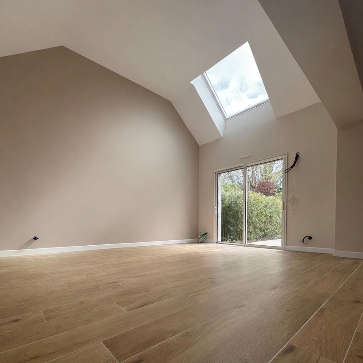 Peinture intérieure d’une extension de maison en grande hauteur<br />
